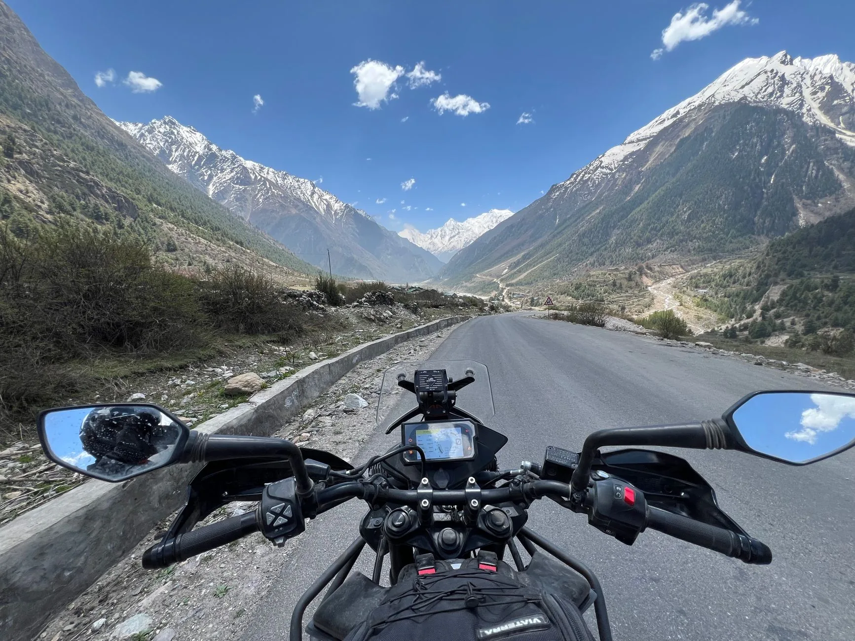 Adventure rider planning journey, motorcycle, European map, leather jacket, muted colors.